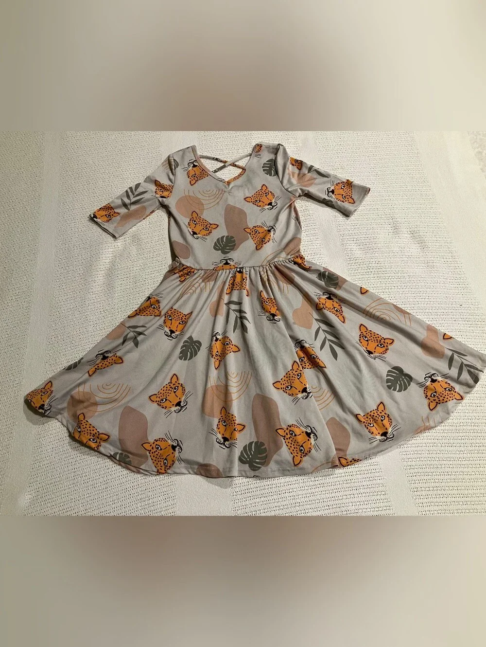 $4 If Bundled. Girls' Leopard Print Twirl Dress
